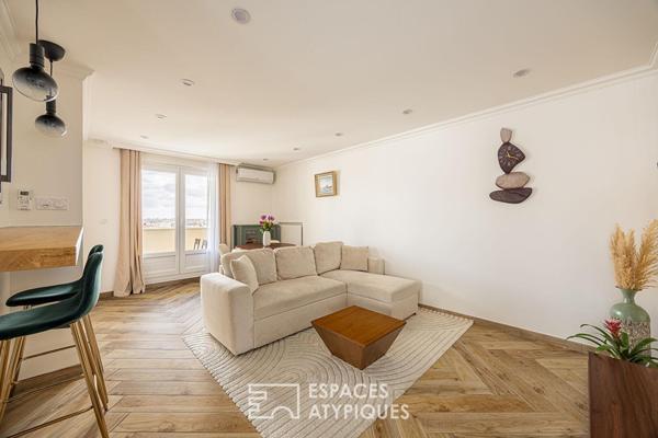 Appartement rénové avec terrasse en avant dernier étage