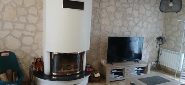 maison de 99 m2  avec 3 chambres avec  salon lumineux sur un terrain arboré de 800 m2