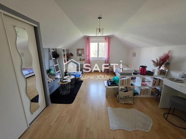 Maison individuelle de 151m2 avec garage et terrain arboré