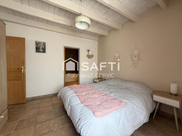 LONGERE DE CARACTERE DE 138 M2 EN CAMPAGNE DE LOCMINE SUR TERRAIN DE 1240 M2