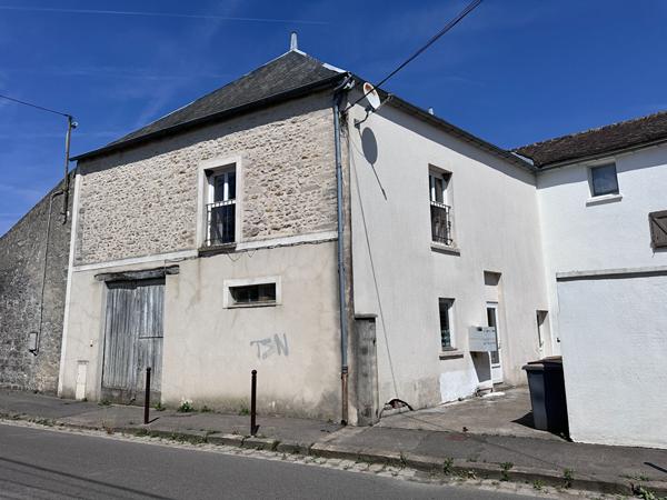 Immeuble de rapport à Tousson 4 appartements + local commercial + garage