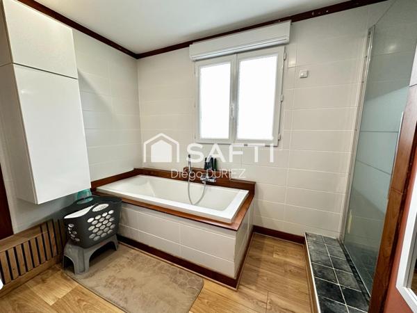 Maison semi plain-pied de 3 chambres avec jardin