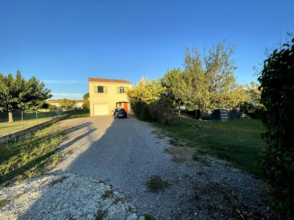 Maison familiale avec jardin arboré