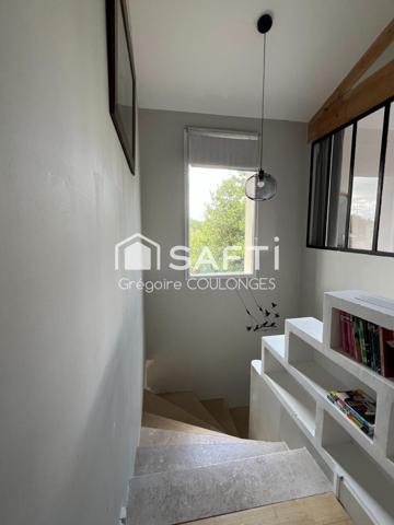 Maison récente de 7 pièces sur terrain arboré