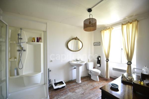 Maison en pierre pleine de charme dans un village recherché (27950)