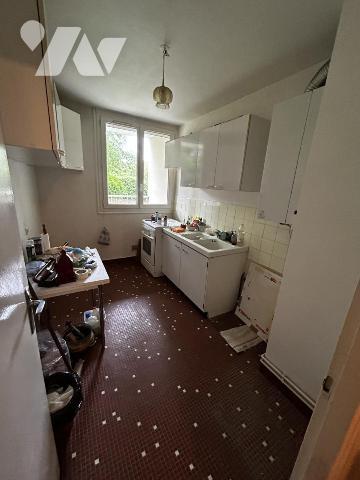 Appartement F2 à rafraîchir avec cave et parking