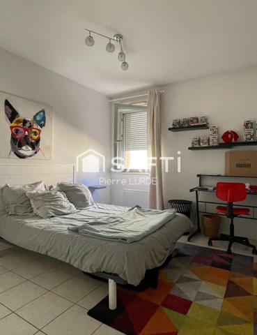Appartement T3 meublé et loué de 73 m2 avec balcon