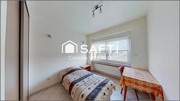 Immeuble de rapport situé à quelques mn de la frontière allemande et de la plateforme de Carling