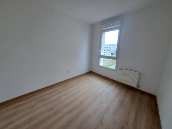 T3 neuf avec balcon et stationnement