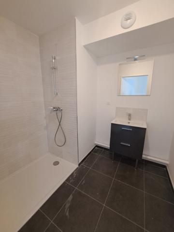 T3 neuf avec balcon et stationnement
