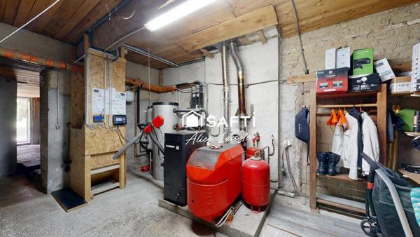 Ancienne ferme avec dépendances sur 1,5 ha