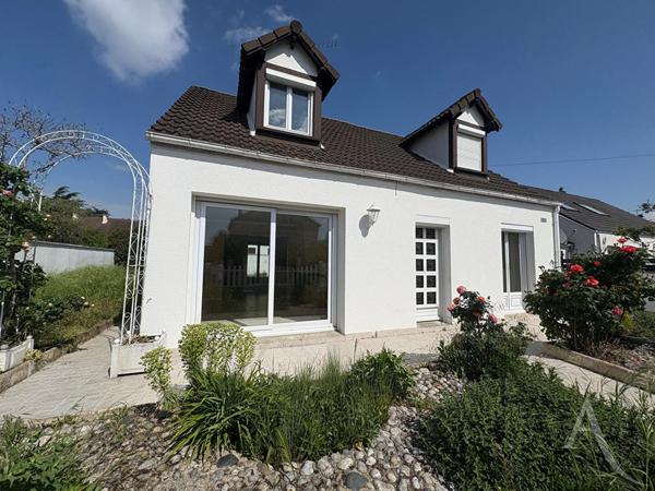 Maison de 105 m² - 2/3 chambres - garage - jardin 311 m² à Les Mureaux