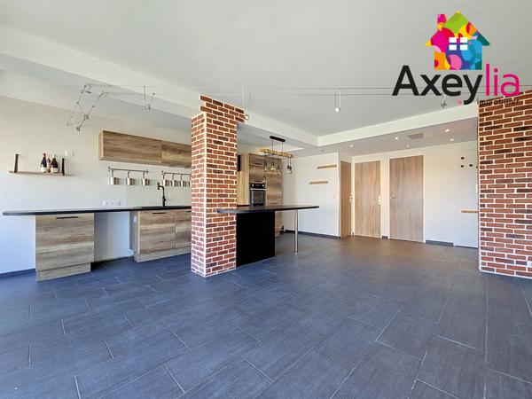 A VENDRE - ROANNE - APPARTEMENT 3 CHAMBRES AVEC CAVE ET PLACE DE PARKING PRIVATIVE