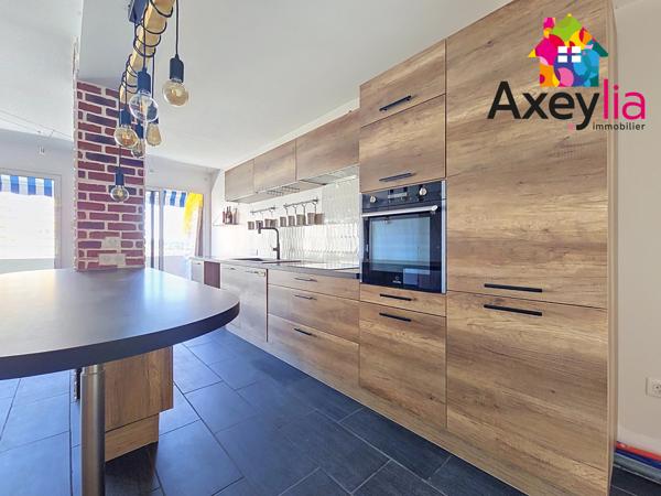 A VENDRE - ROANNE - APPARTEMENT 3 CHAMBRES AVEC CAVE ET PLACE DE PARKING PRIVATIVE