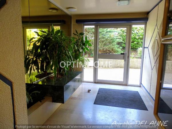 Appartement 92m2 - T4 - 2 chambres - Balcon - Cave - Box - Proche centre-ville et gare RER D