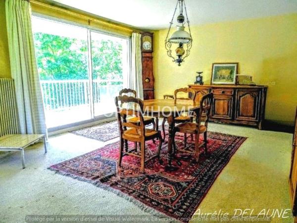 Appartement 92m2 - T4 - 2 chambres - Balcon - Cave - Box - Proche centre-ville et gare RER D