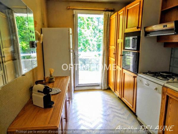 Appartement 92m2 - T4 - 2 chambres - Balcon - Cave - Box - Proche centre-ville et gare RER D