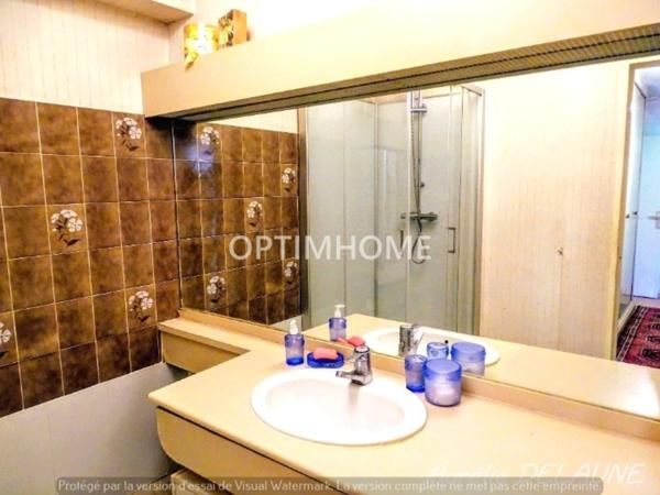 Appartement 92m2 - T4 - 2 chambres - Balcon - Cave - Box - Proche centre-ville et gare RER D