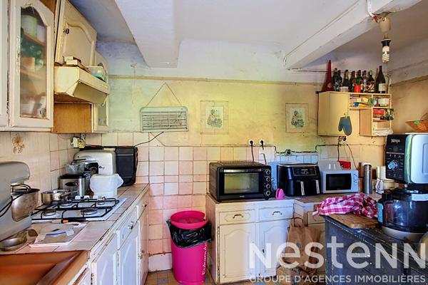 A VENDRE SUR LORGUES -Immeuble en Centre-Ville avec Jardin et Fort Potentiel
