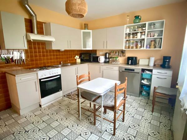 maison avec garage et terrain attenant