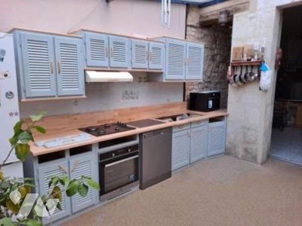 MAISON D'HABITATION EN CENTRE VILLE AVEC PETIT JARDIN ET DEPENDANCE