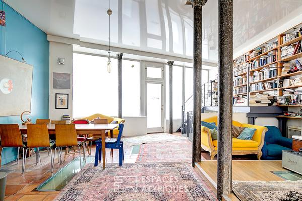 Ancienne boutique transformée en loft familial sur cour privative aux Abbesses