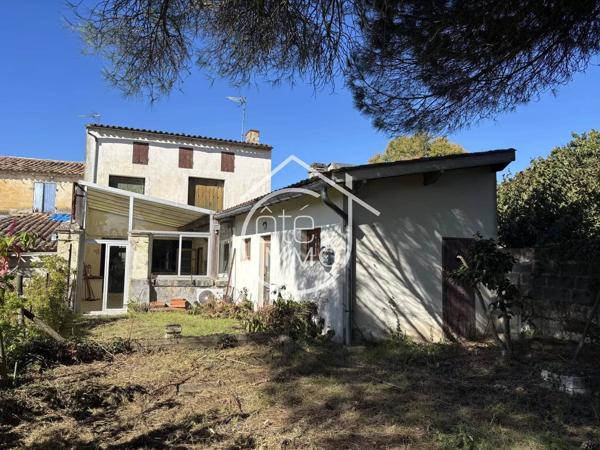 Castillon-la-Bataille : Maison de ville, garage et jardin