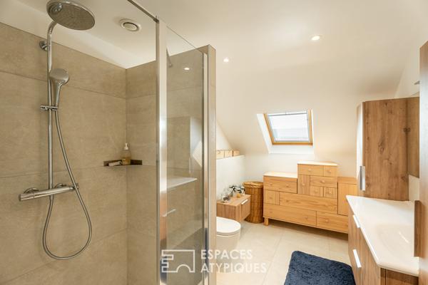 Maison Rénovée avec Extension Bois et Potentiel d’Aménagement à Saint-Avé