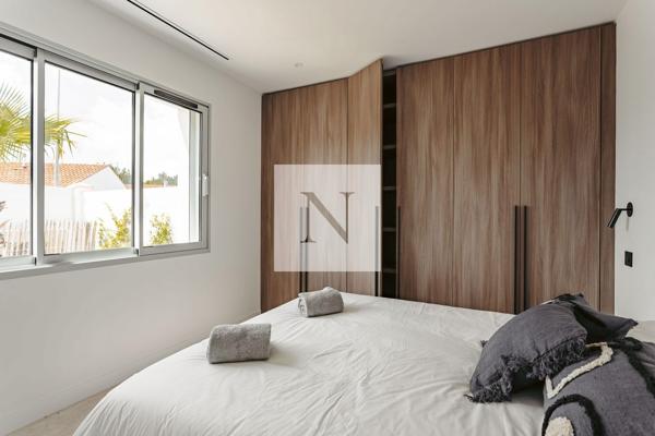 Maison contemporaine de plain-pied — 130 m² — DPE A — Lagord Bourg