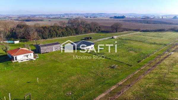 Maison 7 pièces sur propriété équestre de 2.3Ha