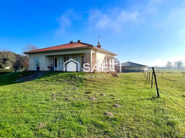 Maison 7 pièces sur propriété équestre de 2.3Ha