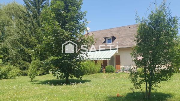 Maison de 128m² sur 2 niveaux sur 1720m² de terrain entièrement plat et arboré avec garage,carpot et Abri de jardin