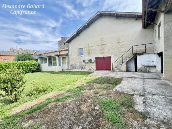 Maison en pierres - 3 chambres -  vaste jardin et grand garage
