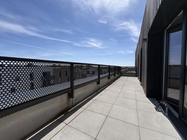 Appartement T4 dernier étage avec terrasse et garages