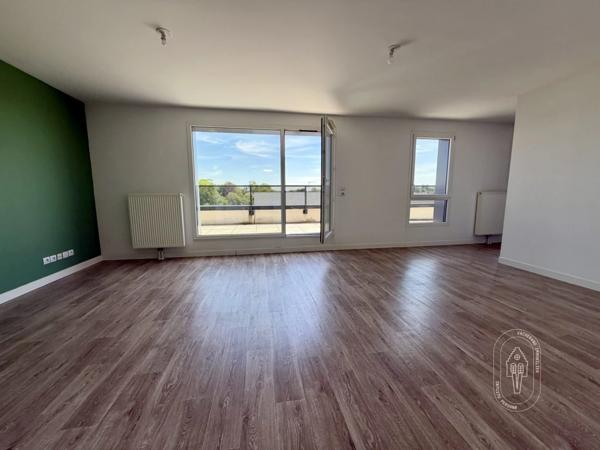Appartement T4 dernier étage avec terrasse et garages