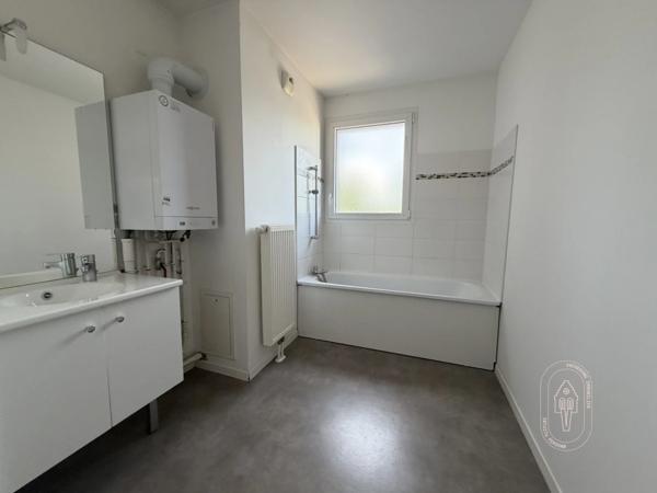 Appartement T4 dernier étage avec terrasse et garages