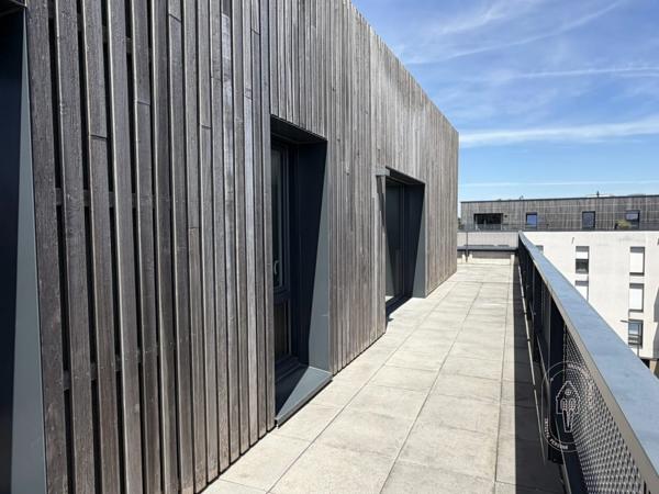 Appartement T4 dernier étage avec terrasse et garages