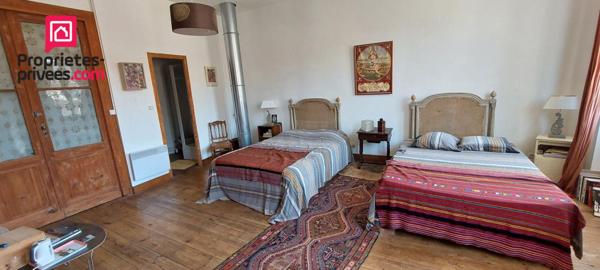 Maison  de caractère  de 185 m²  au coeur du Mas d'Agenais - volumes rares, 2 suites parentales et garage