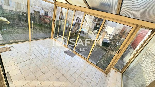 Maison de ville avec cour, véranda et cave voûtée – Virieu-le-Grand