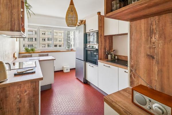 Lyon 6eme - Puvis de Chavanne: Un charmant appartement rénové de 76m2, 2 chambres, un balcon de 13m2.