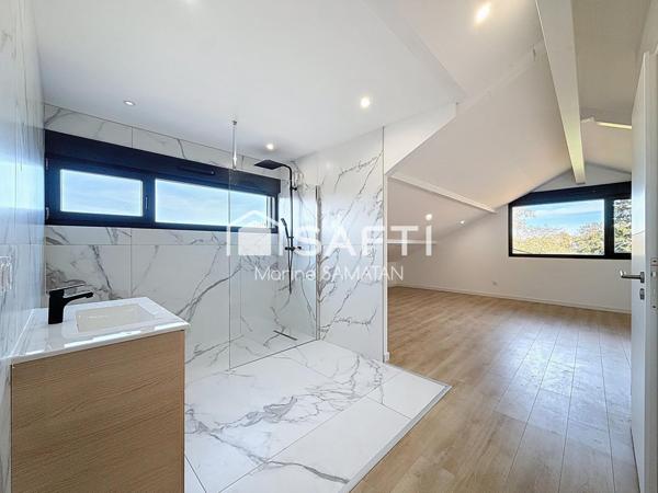 Maison récente avec vues lac