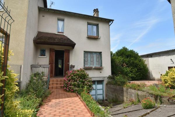 Maison avec garage XXL et fort potentiel