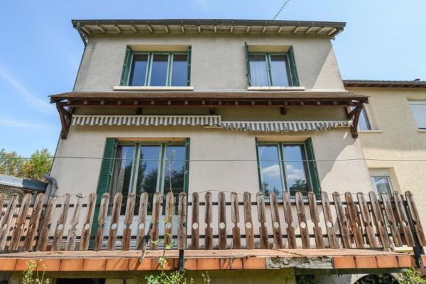 Maison avec garage XXL et fort potentiel