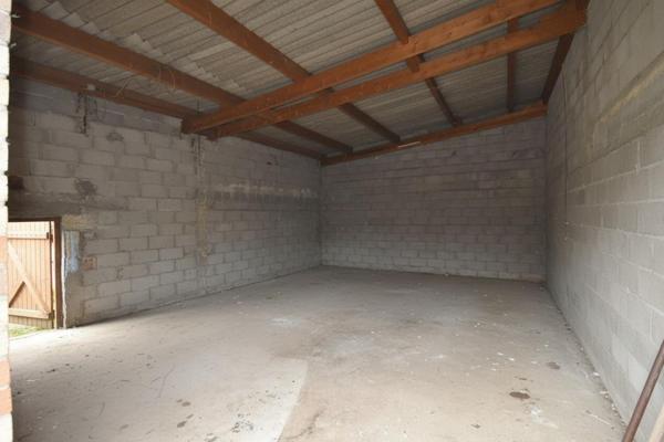 Maison avec garage XXL et fort potentiel