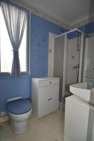 Maison avec garage XXL et fort potentiel