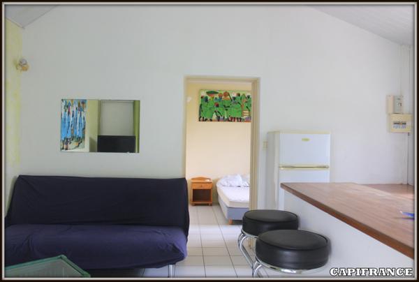 A VENDRE A KOUROU (97310) UNE MAGNIFIQUE MAISON EN BOIS T5 de 106 m² AVEC 2 MAISONS T2 INDEPENDANTES - TERRAIN DE 775 m² - AU PRIX DE 407 000 €.