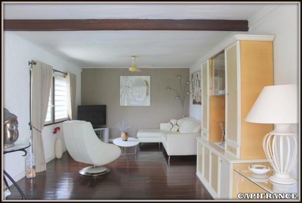 A VENDRE A KOUROU (97310) UNE MAGNIFIQUE MAISON EN BOIS T5 de 106 m² AVEC 2 MAISONS T2 INDEPENDANTES - TERRAIN DE 775 m² - AU PRIX DE 407 000 €.