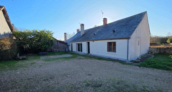 Maison familiale avec grand terrain et potentiel constructible