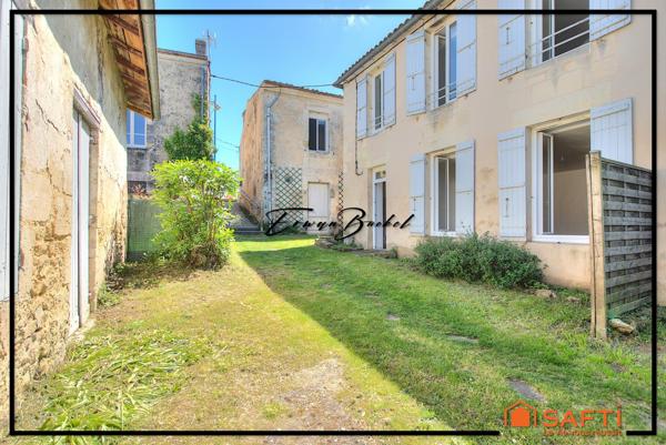 Ensemble immobilier composé de quatre maisons