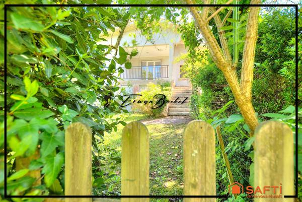 Ensemble immobilier composé de quatre maisons